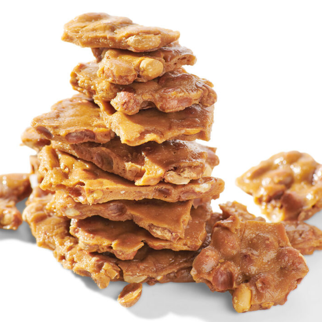 Stack of See's peanut brittle