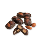 Loose see's almond royal pieces on white background