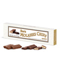 Box of See's Molasses Chips with chocolate bars displayed in front on a white background