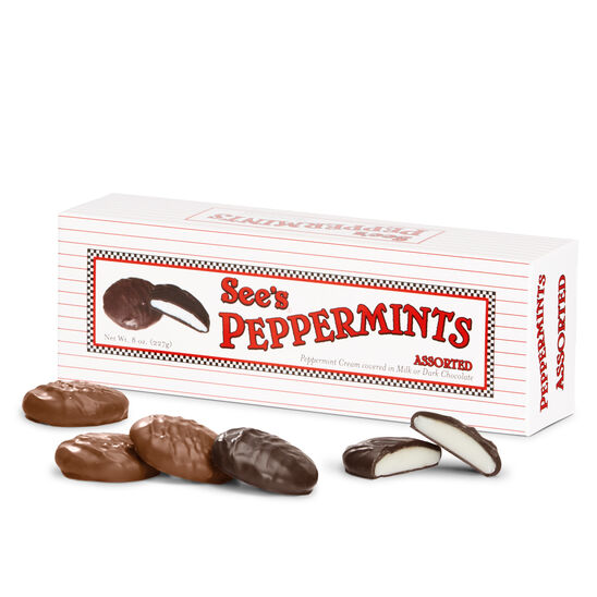 Box of See's Peppermints with peppermint candies displayed in front on a white background