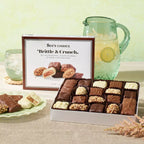 Brittle & Crunch box open on table with lemonade