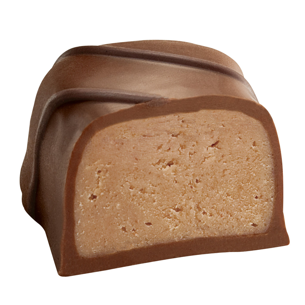 See's cafe hazelnut truffle chocolate half on white background