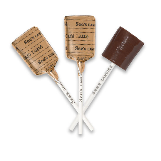 Cade Latte lollipops with foil wrappings on a white background