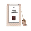 Box of See's Candies Chocolate Coconut Lollypops with a lollipop attached.