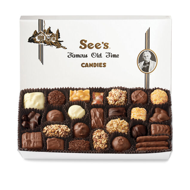 Box of See's Candies featuring a variety of chocolates on a white background