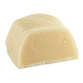 See's Key Lime Truffle White Chocolate half on white background
