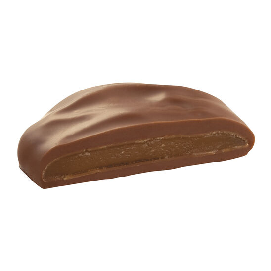 See's milk chocolate pattie half on white background