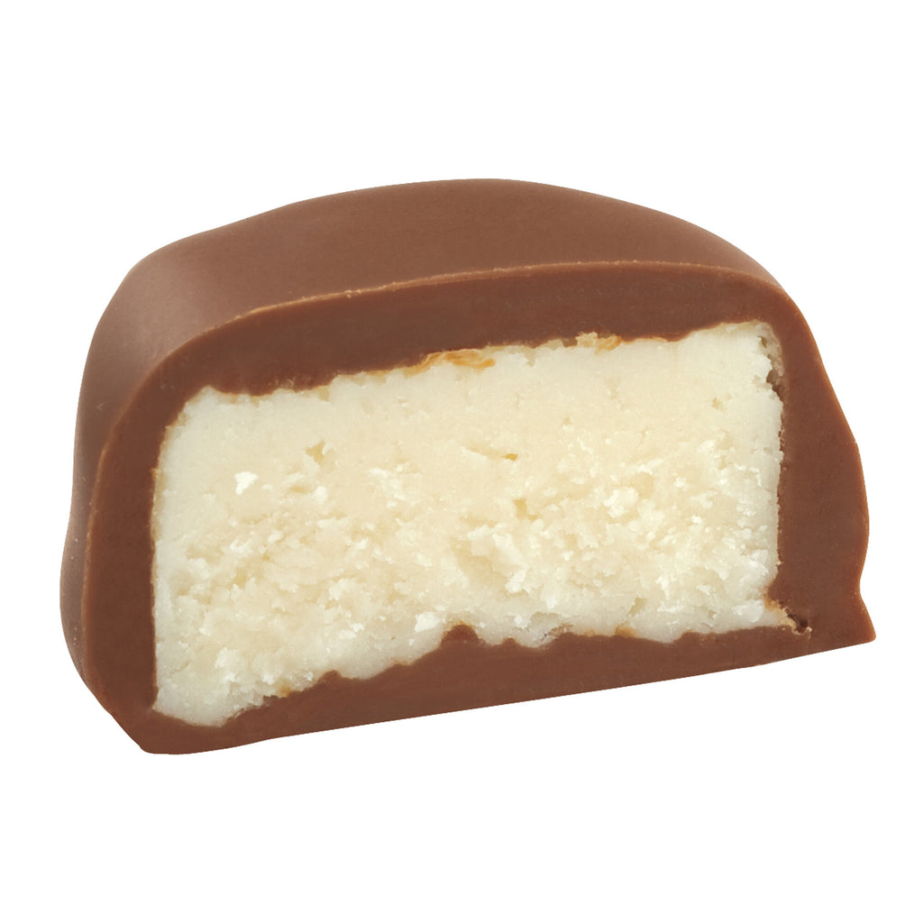 See's milk vanilla buttercream chocolate half on white background