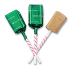 Two lollipops with green candy wrappers and striped sticks on a white background