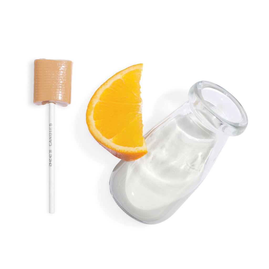 Glass bottle with a wooden cap and orange slice on a white background