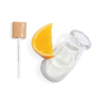 Glass bottle with a wooden cap and orange slice on a white background