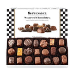Box of See's Candies Assorted Chocolates open on white background