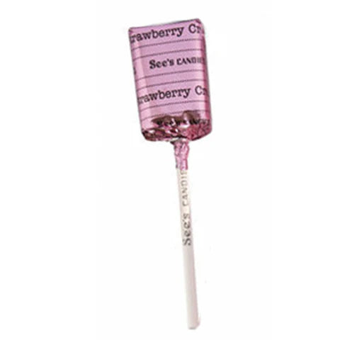 Pink lollipop with a white stick on a white background