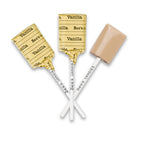 Vanilla flavored lollipops with packaging on a white background